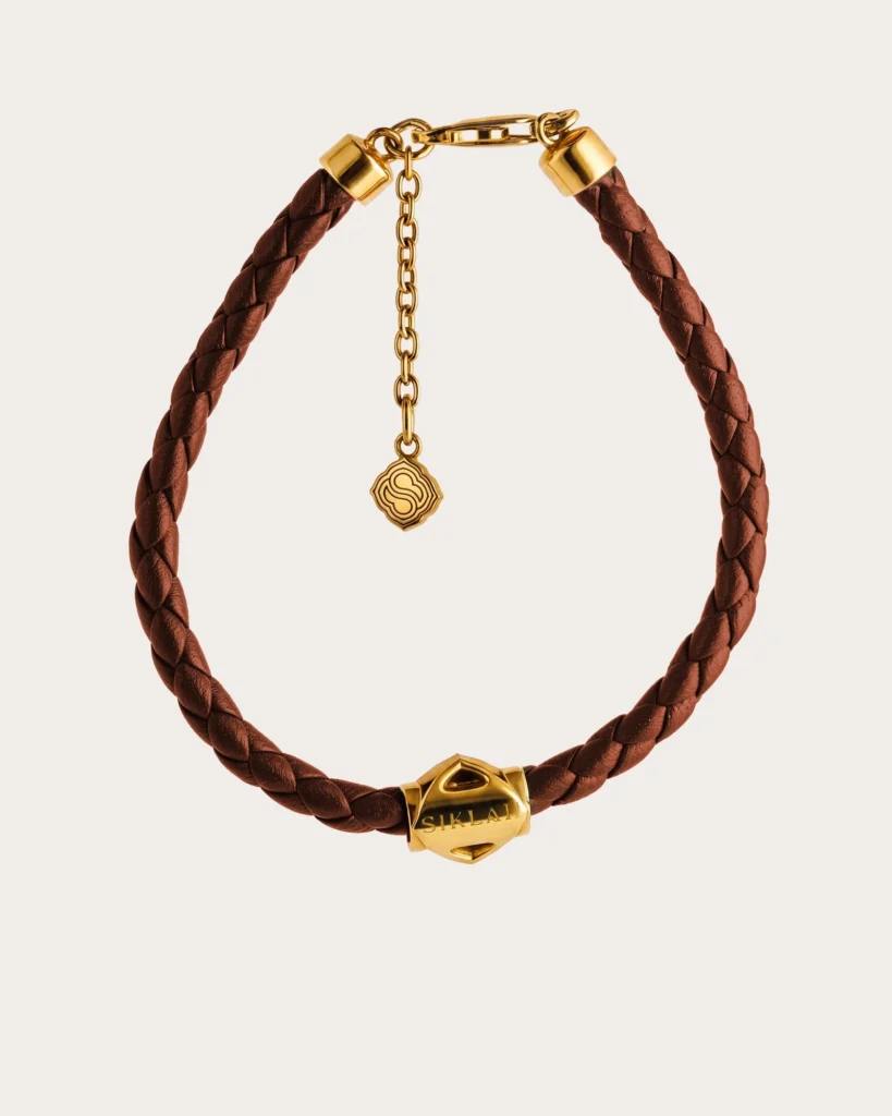 Bracciale Unisex Siklah in cordino colore marrone con nodi in oro giallo