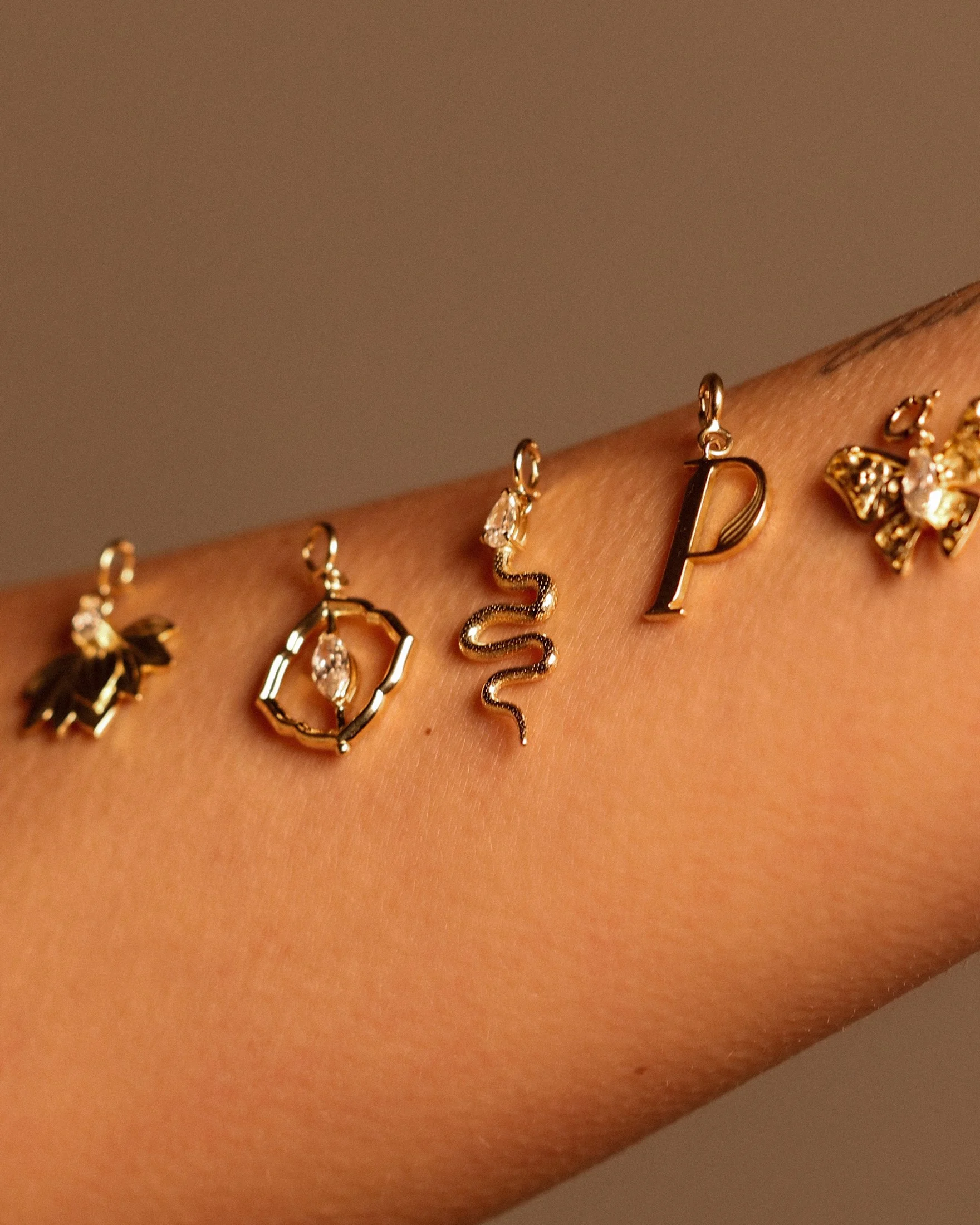 Collezione ALMA Siklah — charms in oro giallo 18k